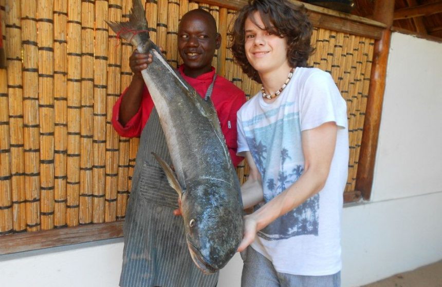 Admiring the local fishing catch, Mozambique