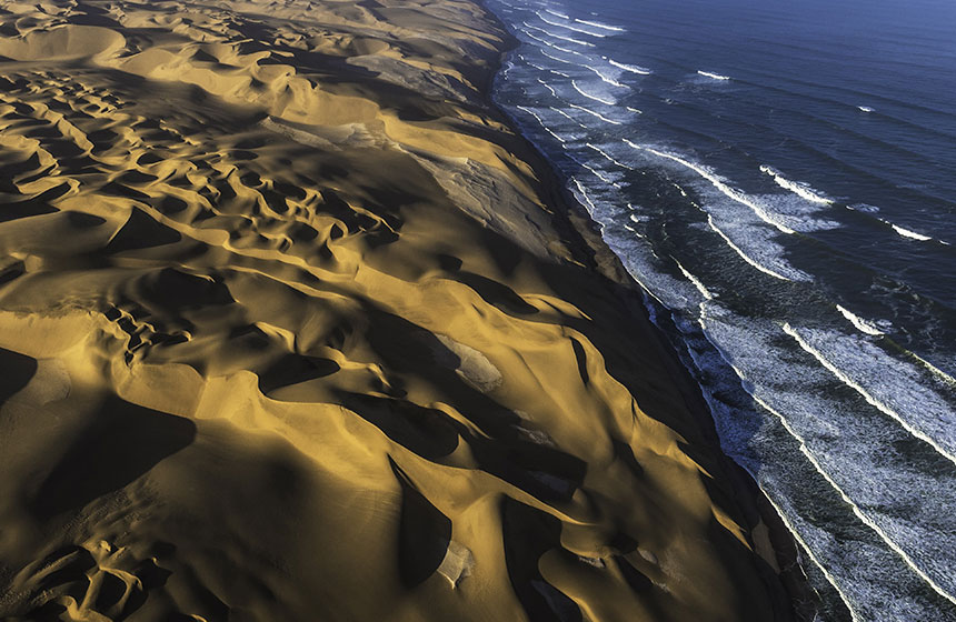 Sand dunes by the ocean, Namibia